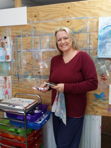 Artist Sunday L at her easel